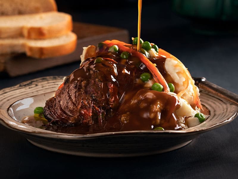 Pouring Gravy Pot Roast